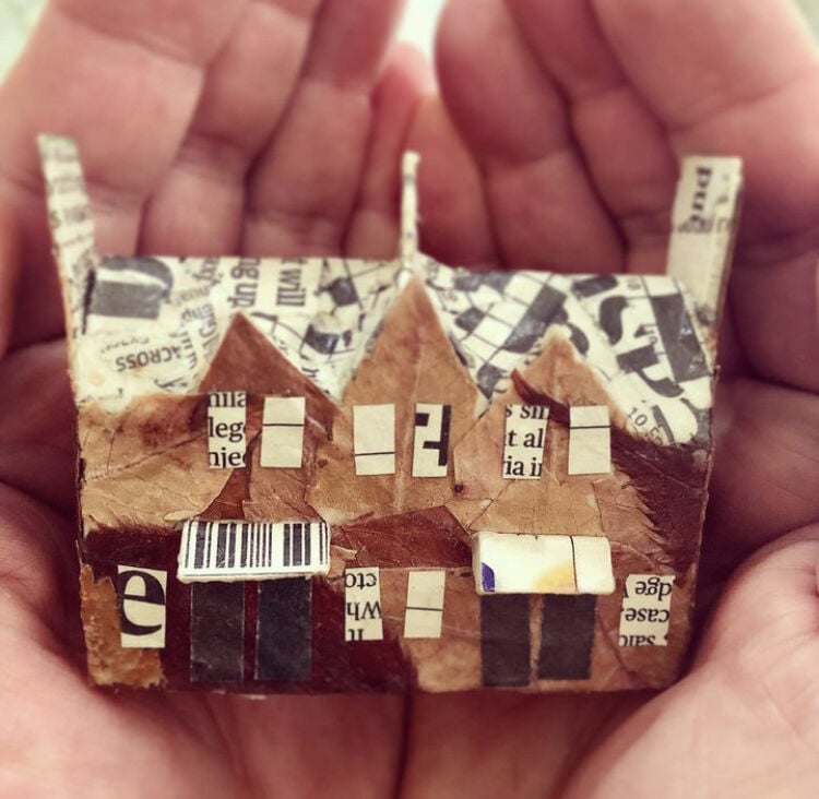 House made of papier mache and leaves