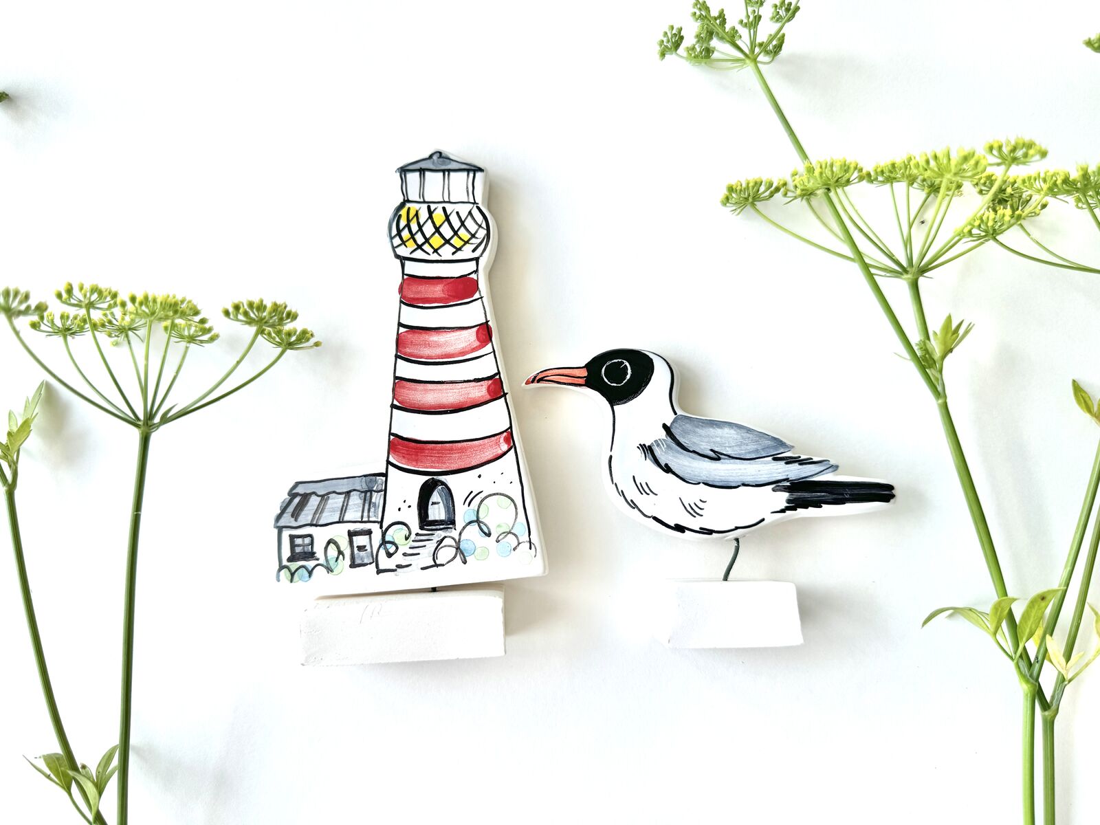 Black headed gull and lighthouse