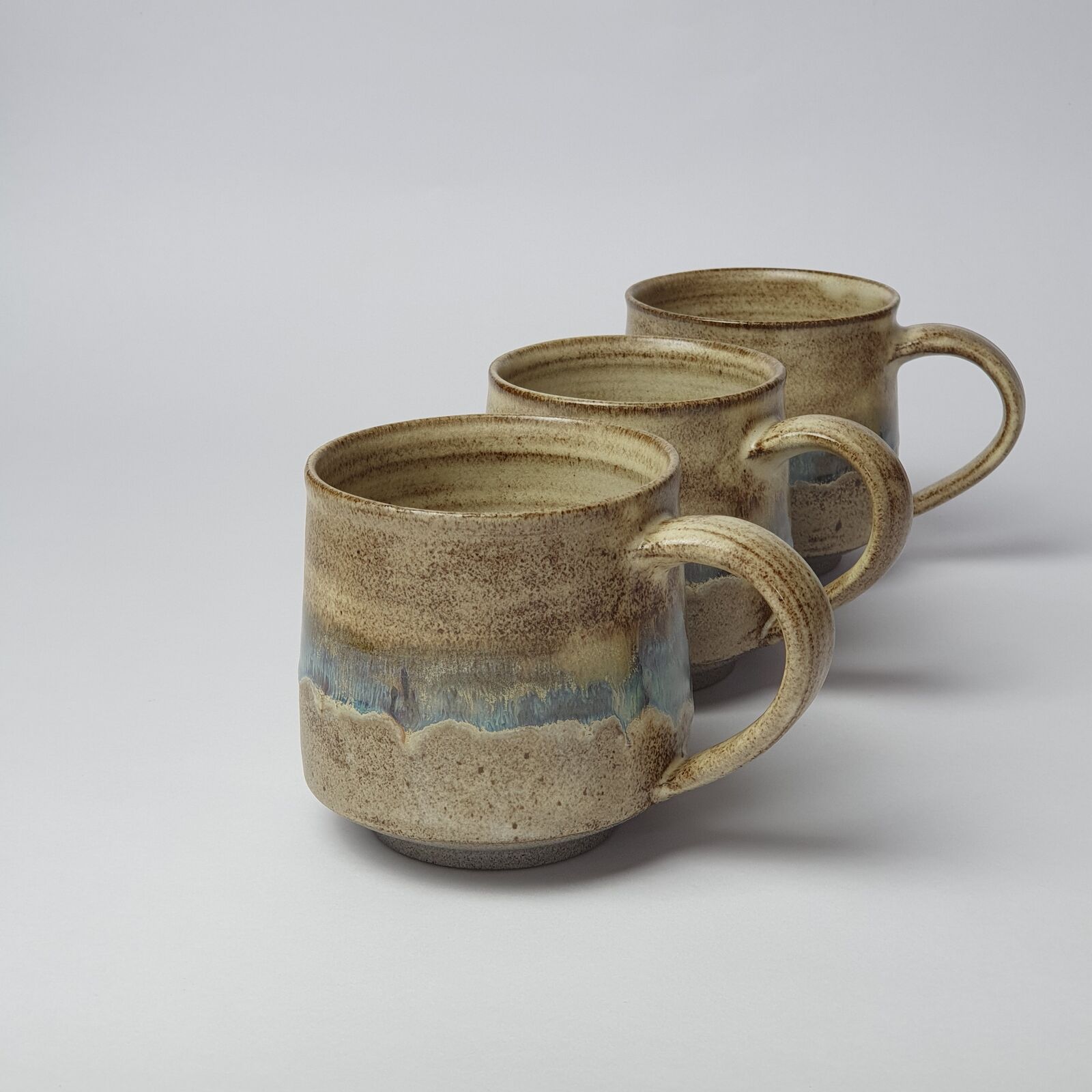 Ceramic shoreline mugs