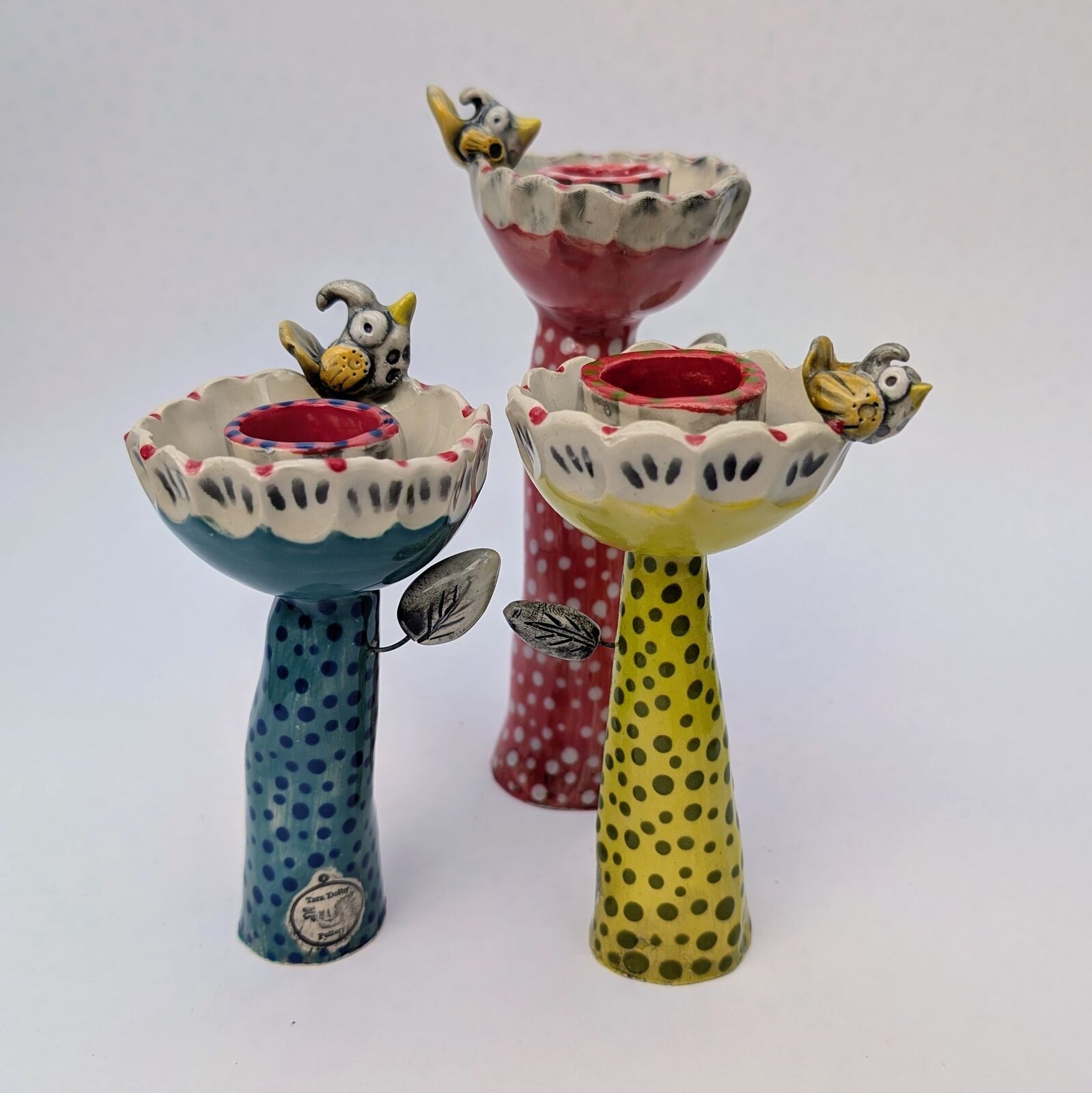 Cheeky bird candlestick