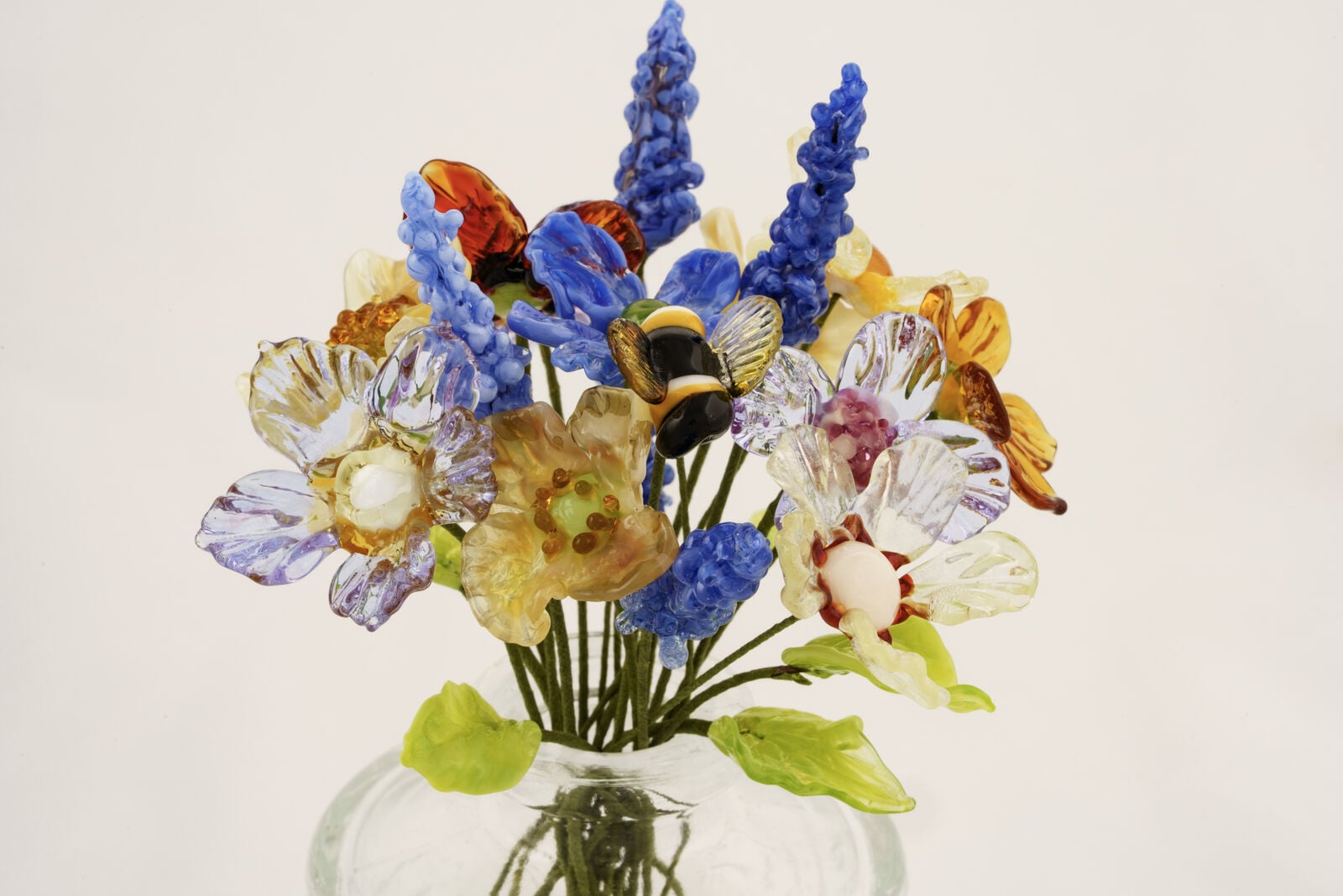 A selection of lamp worked glass flowers