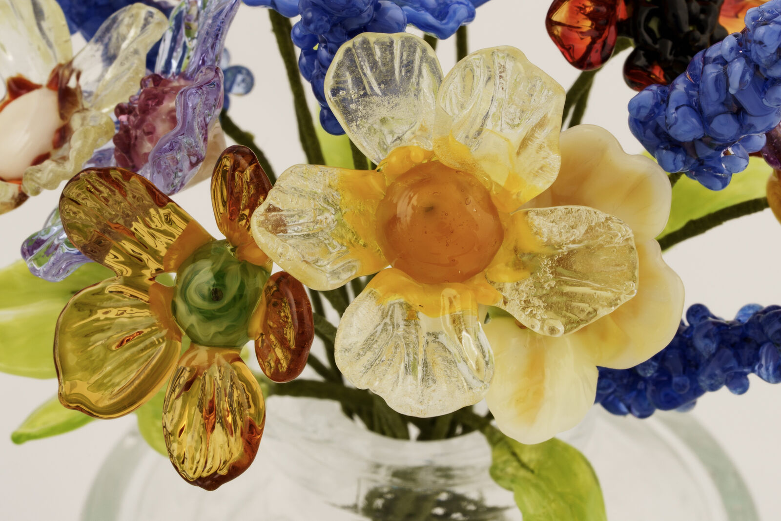 Close up detail lamp work glass flowers