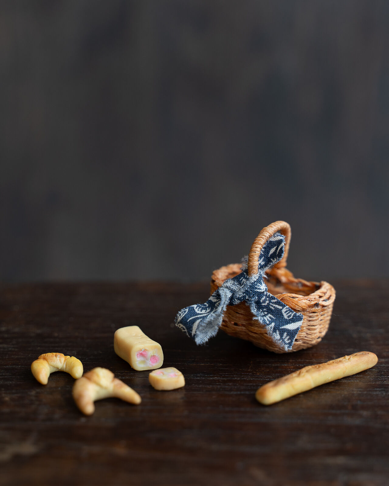 Miniature handcrafted weaved basket and polymer clay food