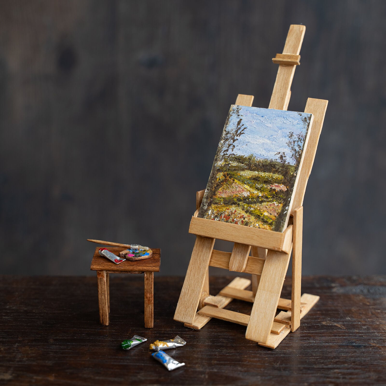 Miniature fields painting on easel