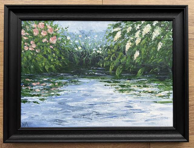 Petals on calm water.