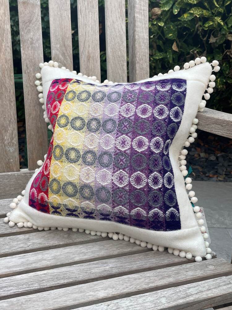 Small square Cushion. Circles and Pom-poms
