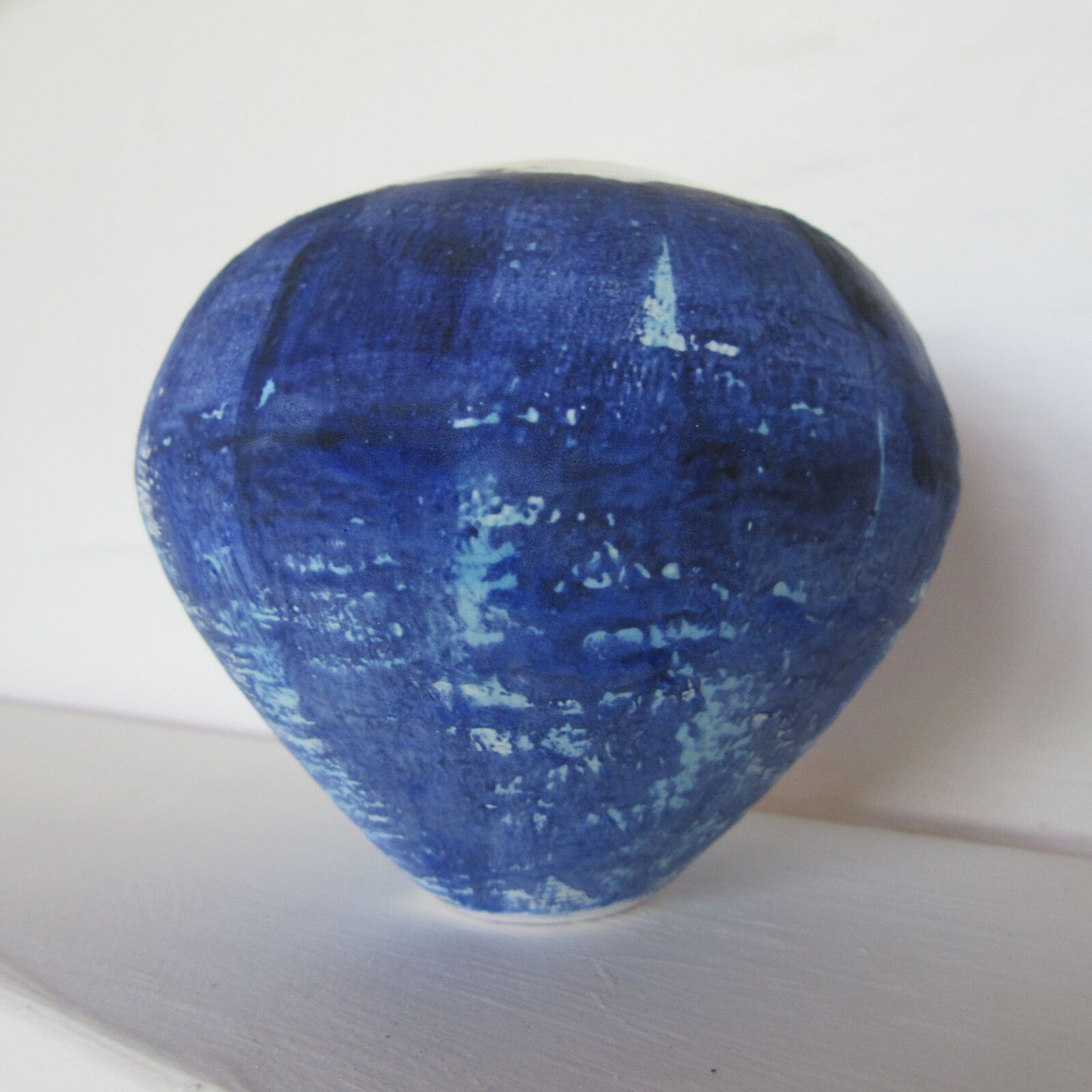Blue oxide mixed with blue matt glaze